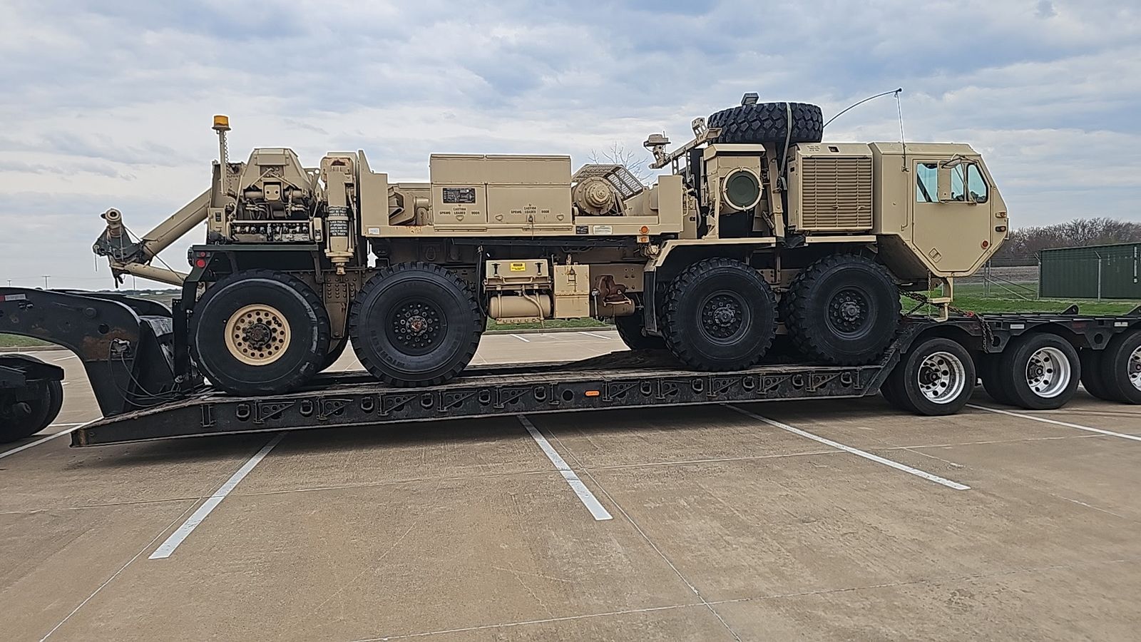 Military vehicle on lowboy